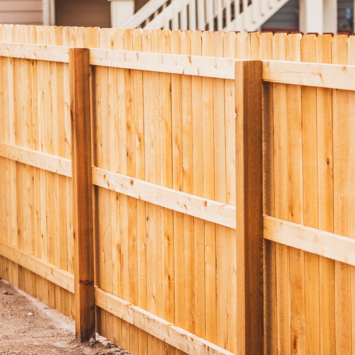 Cedar wood privacy fence with dog-ear pickets in a Conroe Texas backyard