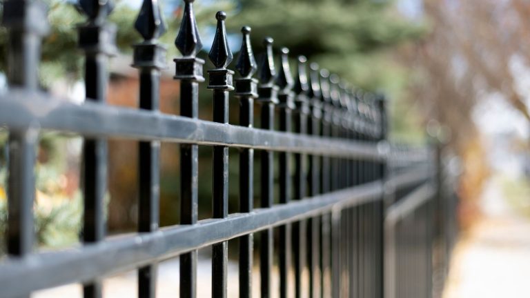 Black ornamental iron fence with spear top pickets in Montgomery County